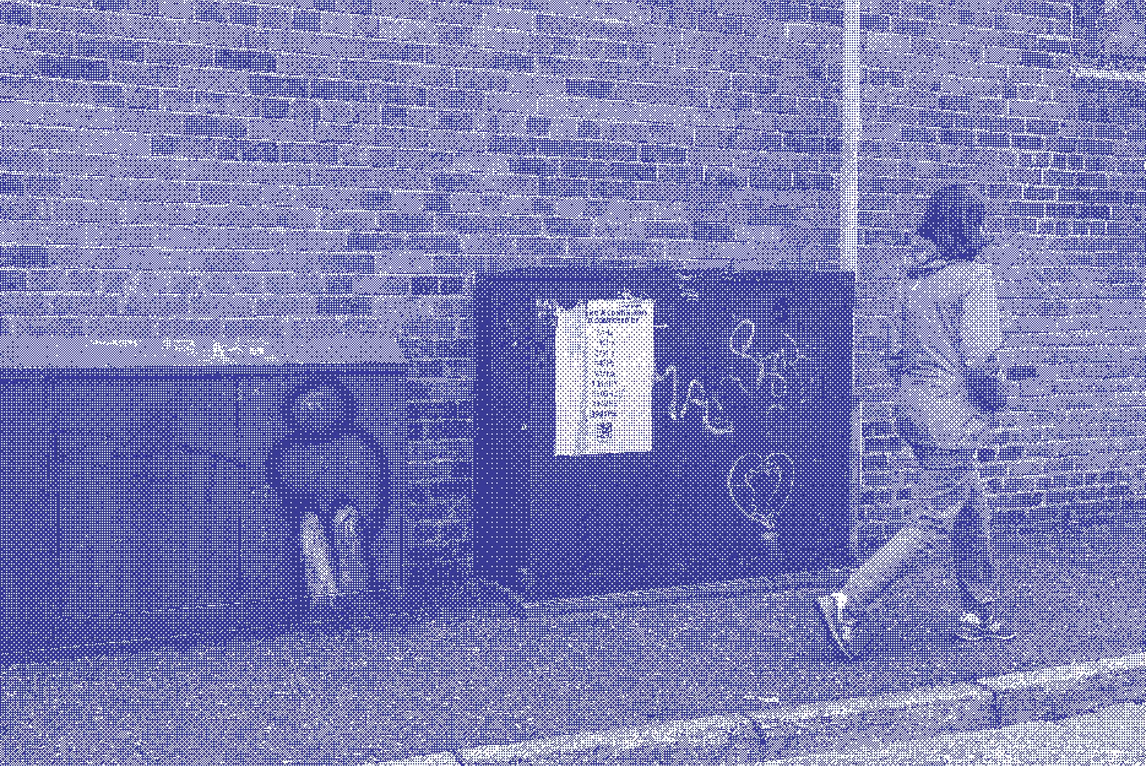 a person walks in front of a telecommunication box